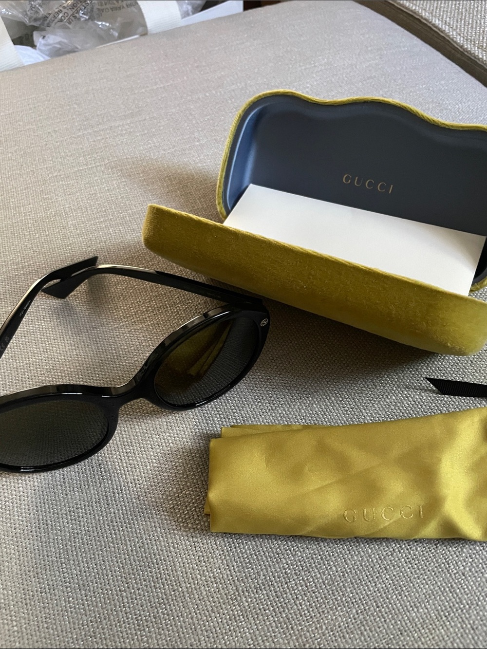 Gucci Black Oval Sunglasses with Yellow-Green Velvet Case and Pouch